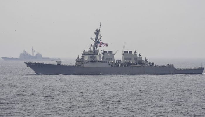 China protests to US over sail-by in disputed waters
