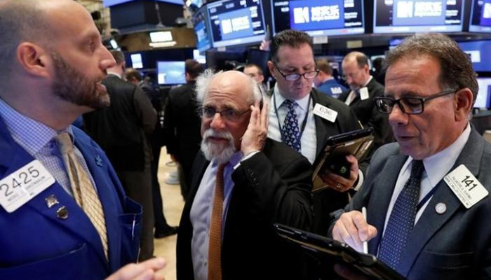 Wall Street ticks higher to record close; eyes on earnings, Fed