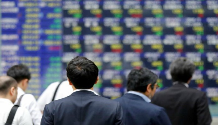 Asian shares conquer 10-year peak, oil up on Iraq tensions