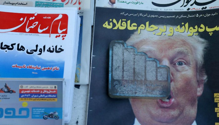 Iranians fear economic hardship, but united against Trump