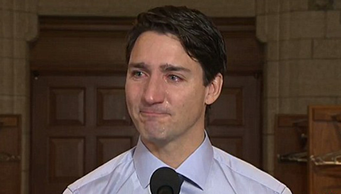 Canadian Prime Minister Justin Trudeau weeps as he pays tribute to Tragically Hip singer