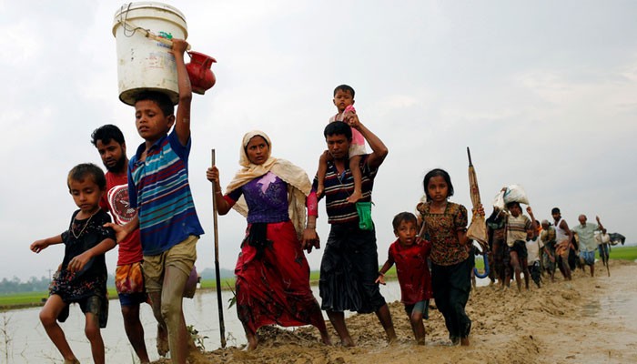 Bangladesh lets stranded Rohingya into camps after screening
