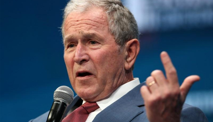 Bush takes veiled swipe at Trump, defends immigration and trade