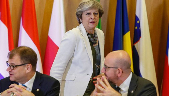 EU leaders back May with move on Brexit talks