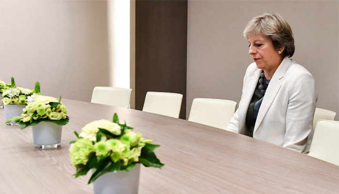 UK PM May's 'lonely' Brexit photo goes viral
