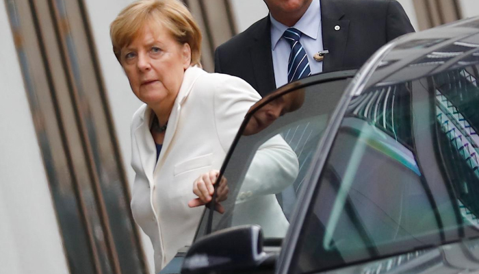Matchmaker Merkel seeks awkward three-way embrace
