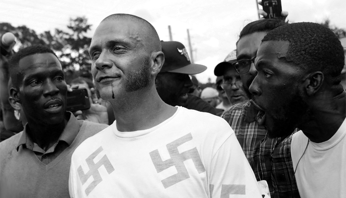 A white supremacist in the midst of a protest: the story behind the picture