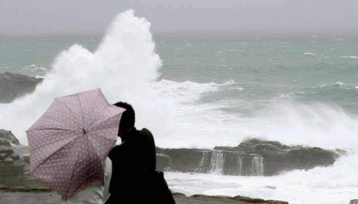 Powerful typhoon drenches Japan, tens of thousands advised to evacuate