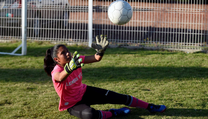 Mexican girls fight violence with boys' own game: football