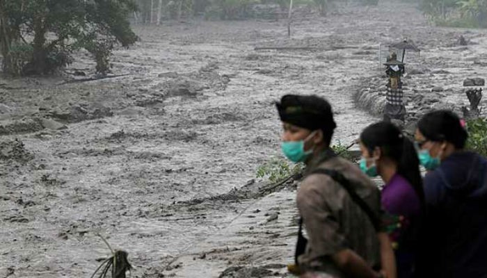 At least 11 dead as floods and landslide hit Indonesia