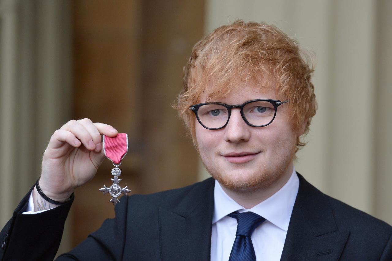 Pop star Ed Sheeran receives honour from Britain's Prince Charles