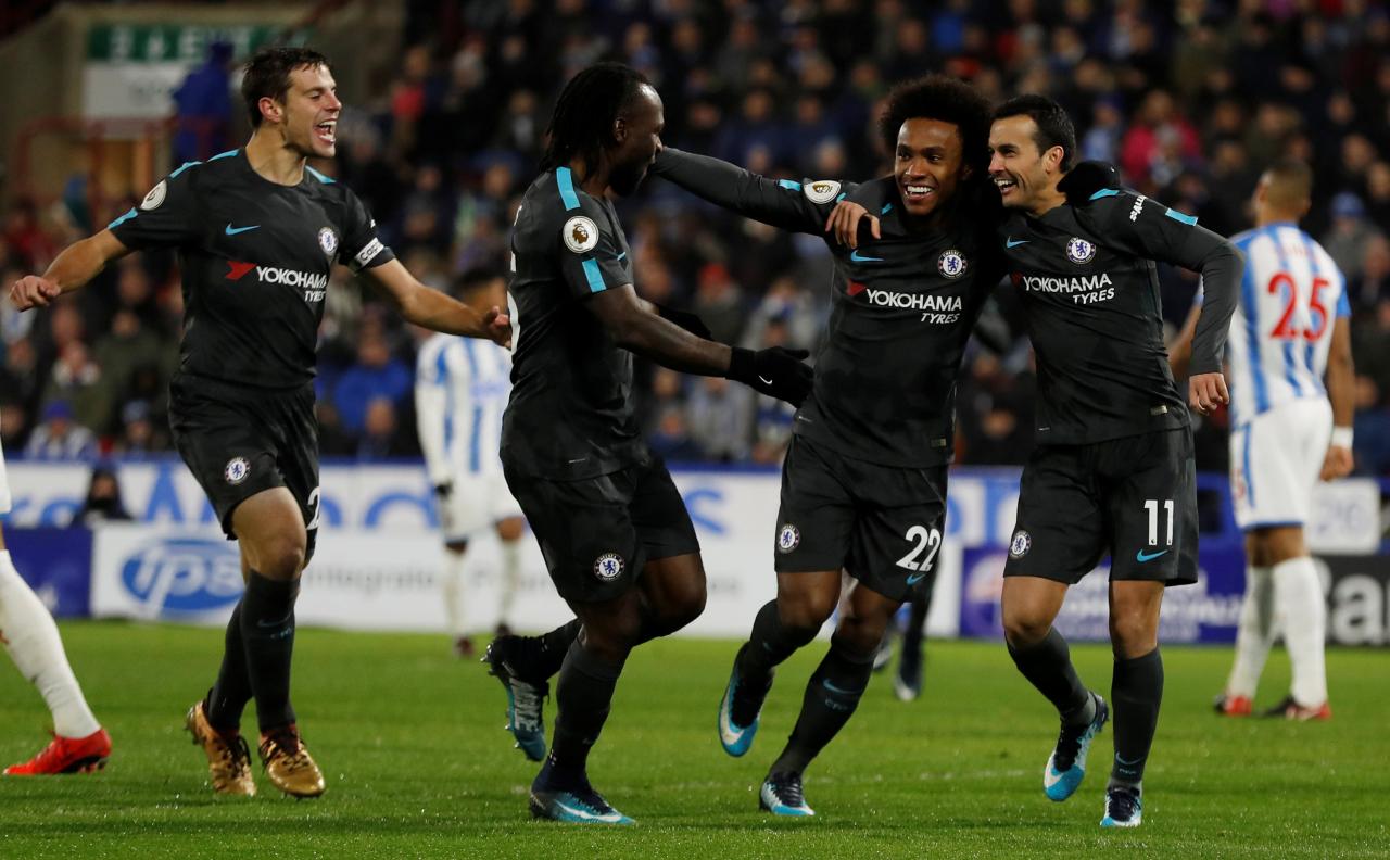 Chelsea cruise to 3-1 victory at Huddersfield, Burnley go fourth