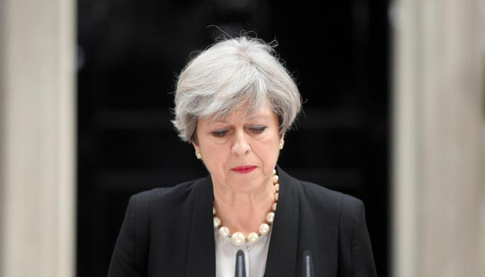 May defeated in parliament over Brexit blueprint