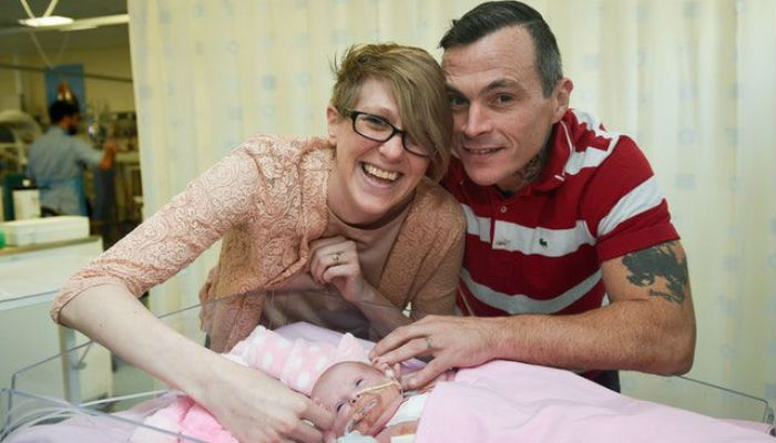 Baby girl survives being born with heart outside chest