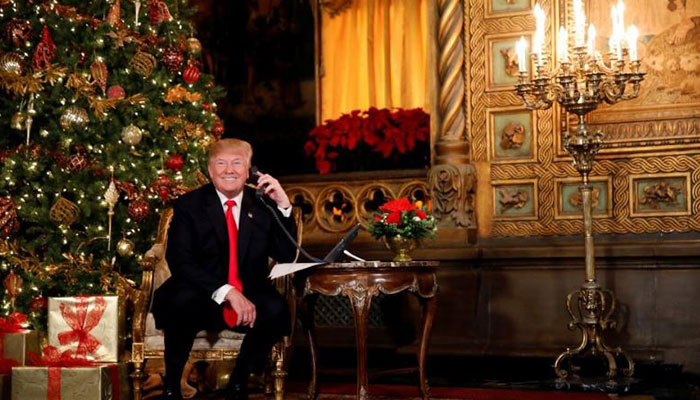 Image result for Donald Trump took calls from children on Christmas