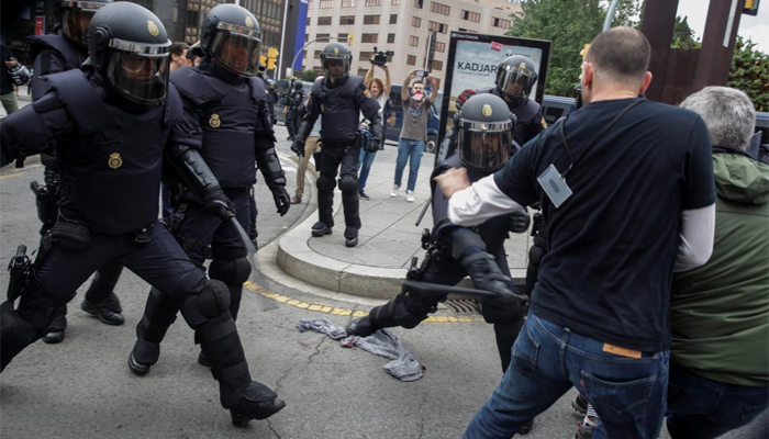 Spain pulls police reinforcements from Catalonia