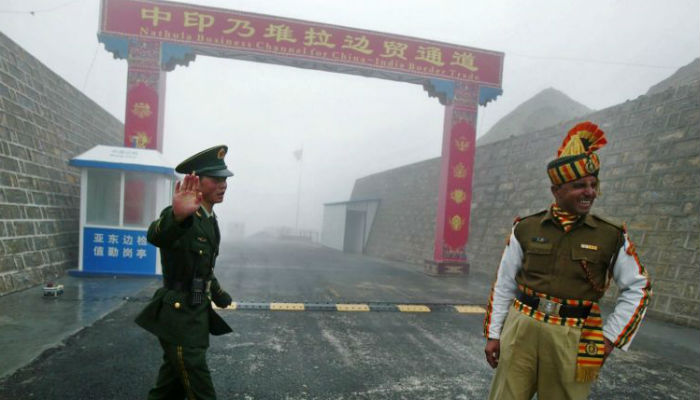 India steps up China border patrols, vows to handle 'assertiveness'