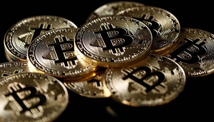 Bitcoin slides 14 percent on crackdown fears, hits four-week low