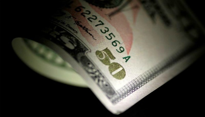 Dollar hits three-year low as bounce sputters, euro shakes off political concerns