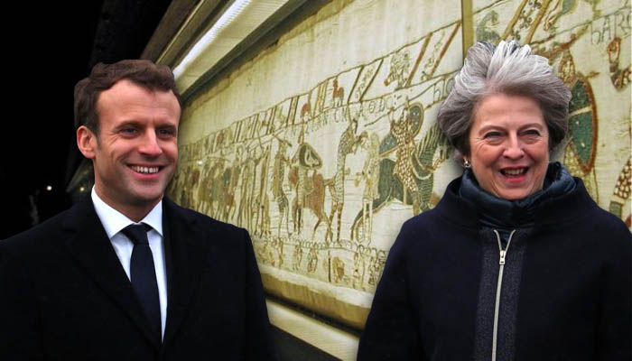 May, Macron strike border security deal at UK summit