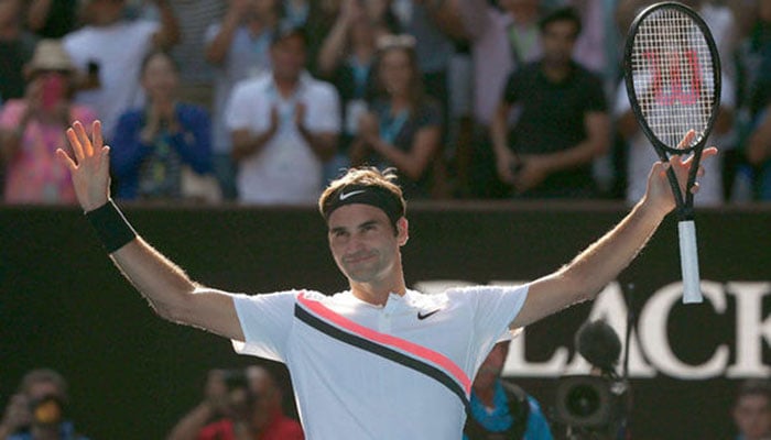 Federer roars into Australian Open quarterfinals