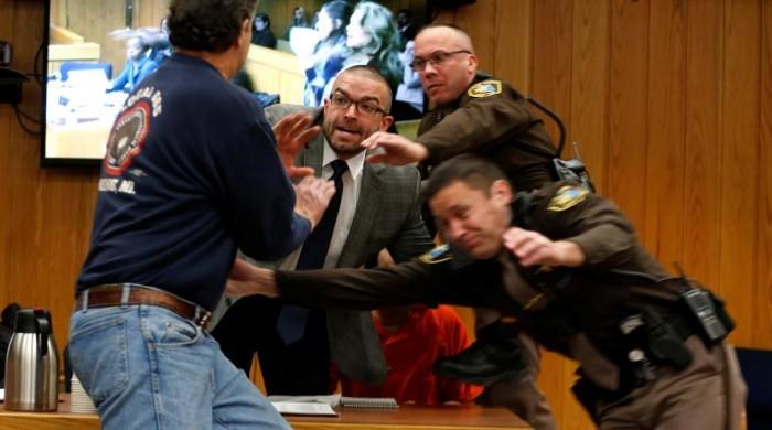 Father of molested girls charges disgraced USA Gymnastics doctor in court