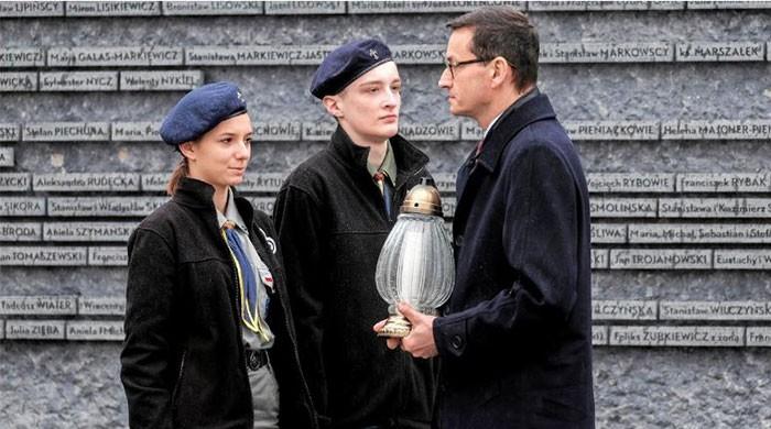 Pressure mounts on Poland to back away from Holocaust bill