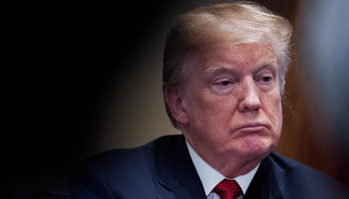 US President Donald Trump attends a roundtable discussion in the White House in Washington DC US