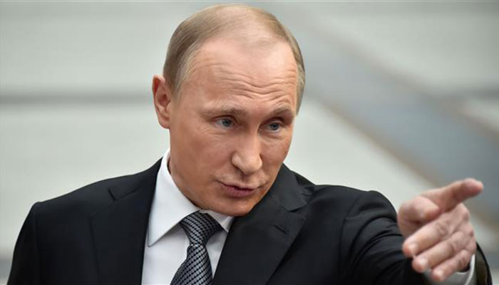 No programme, no debate but Putin cruising to poll win