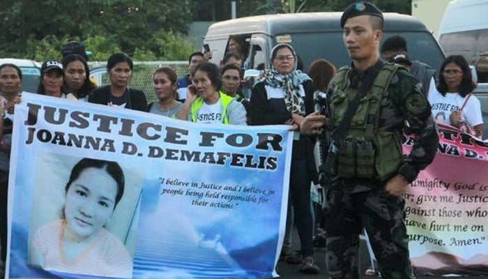 Call for justice as Filipina's body returns home from Kuwait
