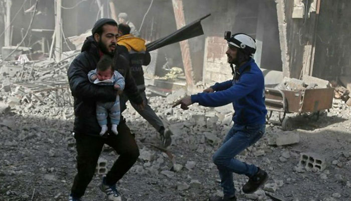 77 dead as Syria enclave pounded ahead of expected ground assault