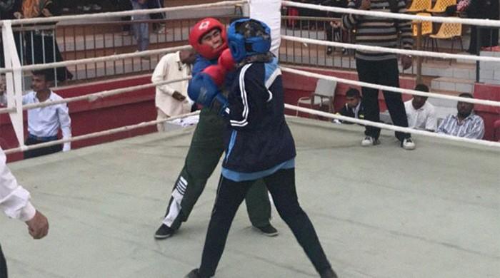 In Karachi’s Lyari, women break barriers one punch at a time