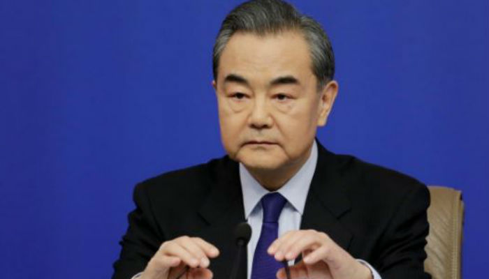 China's 'silver fox' foreign minister promoted