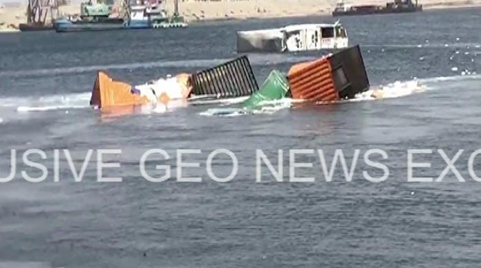 21 containers fall into sea after two ships collide at Karachi port 