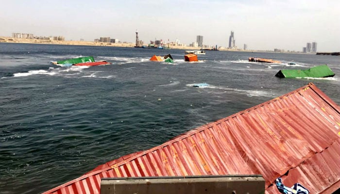 KPT authorities pull containers from sea after ship scrapes another KPT authorities pull containers from sea after ship scrapes another
