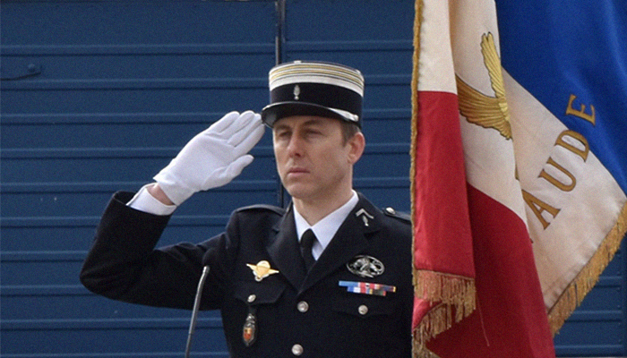France mourns 'hero' officer who took place of hostage in attack