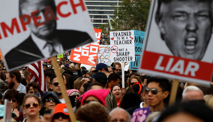 Huge rallies led by students demand tighter US gun controls