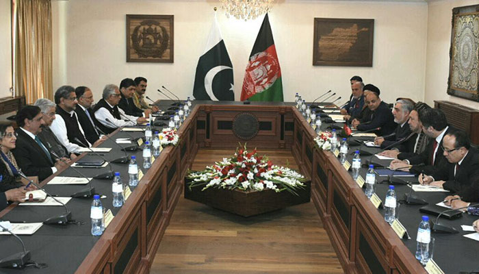 Abbasi, Ghani agree on political solution to Afghan conflict