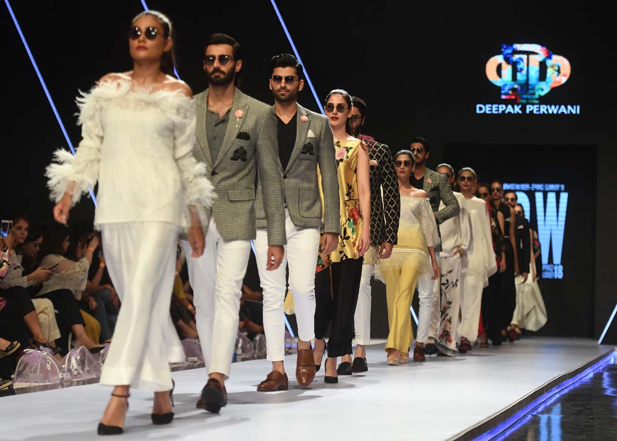 Models present creations by Deepak Perwani. Photo: AFP