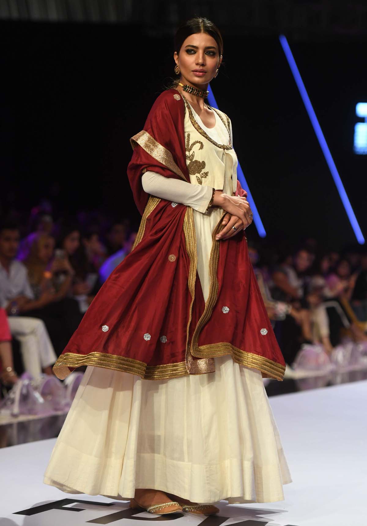 A model presents a creation by Boheme by Kanwal. Photo: AFP