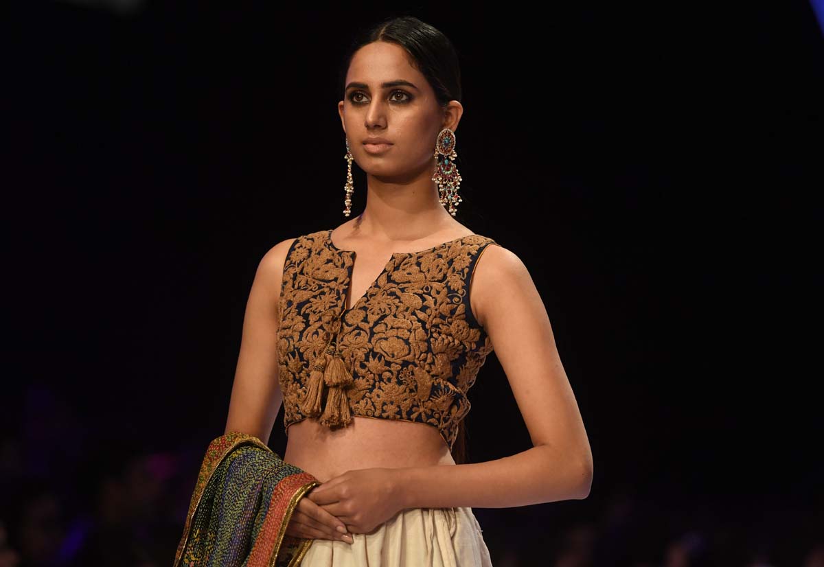 A model presents a creation by Boheme by Kanwal. Photo: AFP