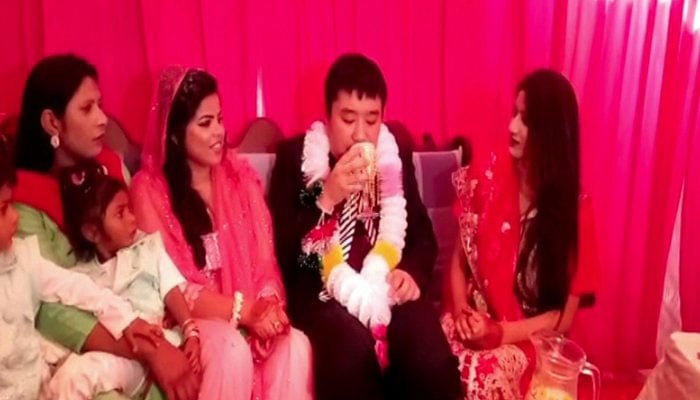 Chinese man flies to Pakistan to marry woman from Sargodha  