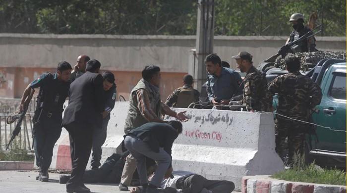 At least 21 killed in successive Kabul blasts  Policemen help Afghan journalists, victims of a second blast, in Kabul, Afghanistan April 30, 2018. Photo: Reuters KABUL: Two blasts hit the Afghan capital Kabul on Monday, killing at least 21 people, including a photographer for French news...