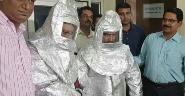 Delhi police parade 'space suit' scammers after NASA claims exposed