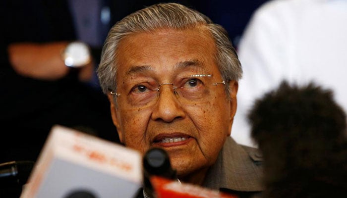Malaysia's Mahathir sworn in as world's oldest leader after shock poll win