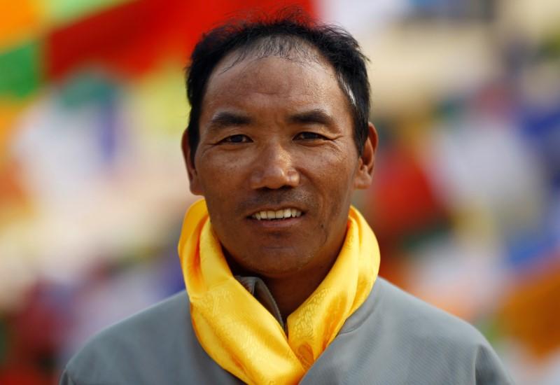 Two Sherpa climbers set new summit records on Everest