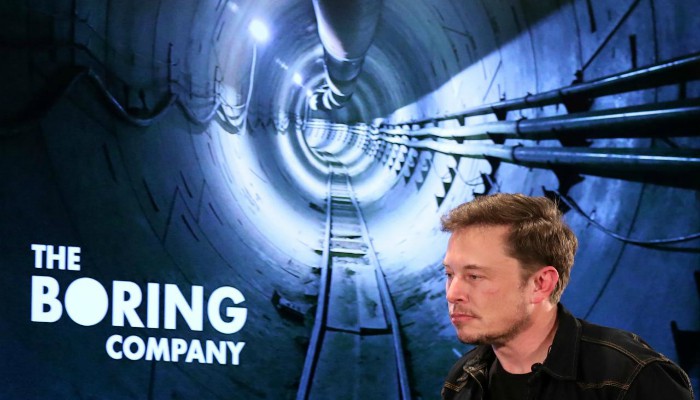 Elon Musk arrives to speak at Boring Company community meeting in Bel Air Los Angeles California