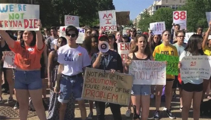 Locals, exchange students in US protest against gun violence outside White House