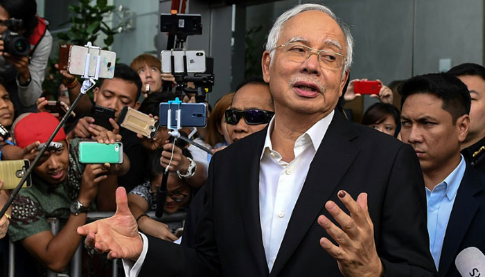 Almost $30 million and 400 handbags seized in corruption raids linked to Malaysia's Najib