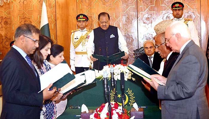 Two new caretaker federal ministers take oath